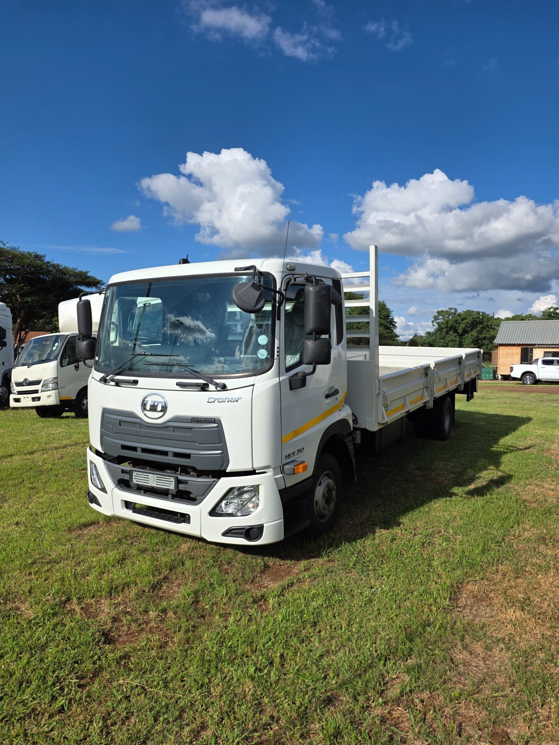2025 UD Croner MKE 210 Dropside Body - Front view