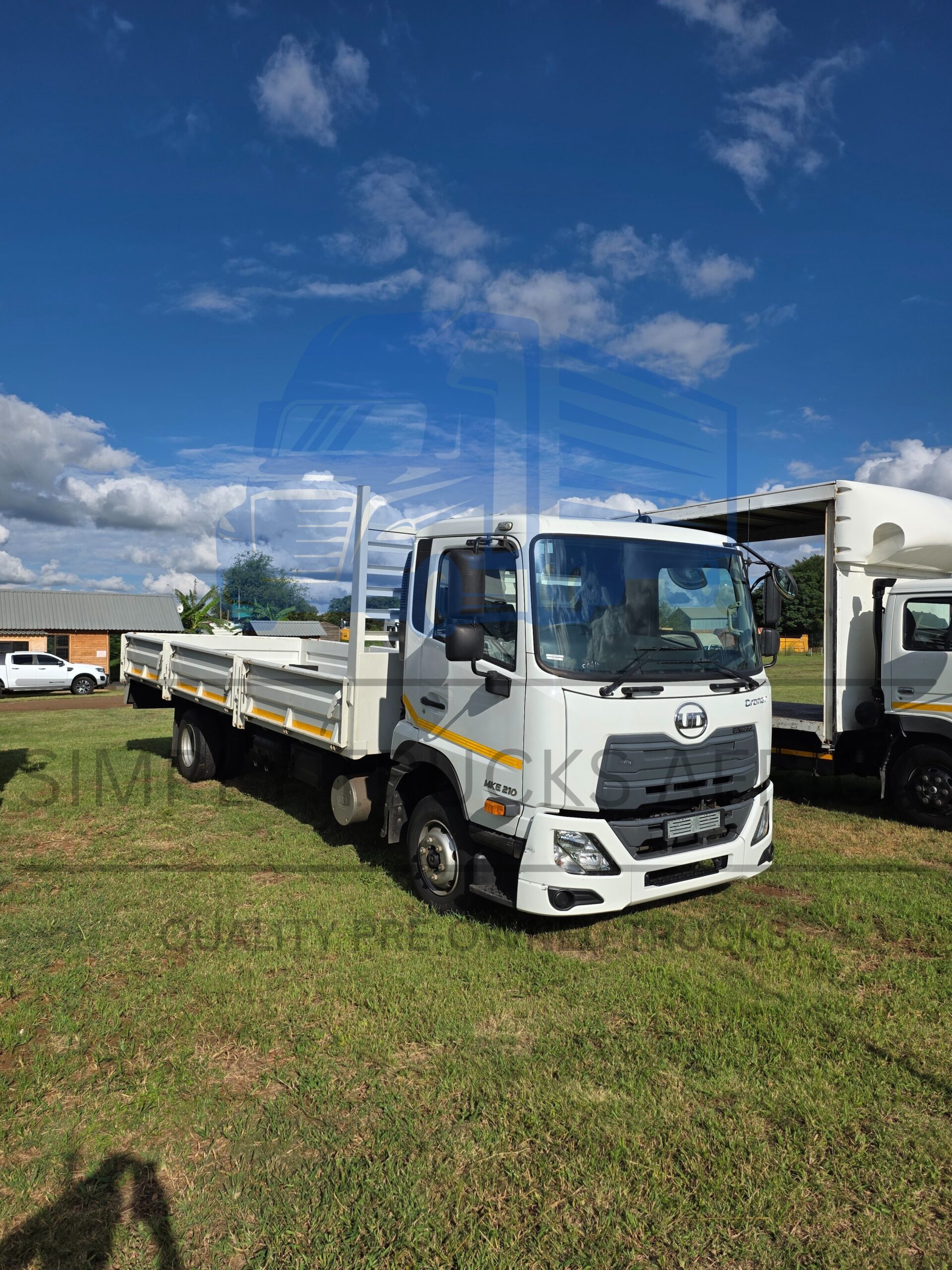 2025 UD Croner MKE 210 Dropside Body - Front View