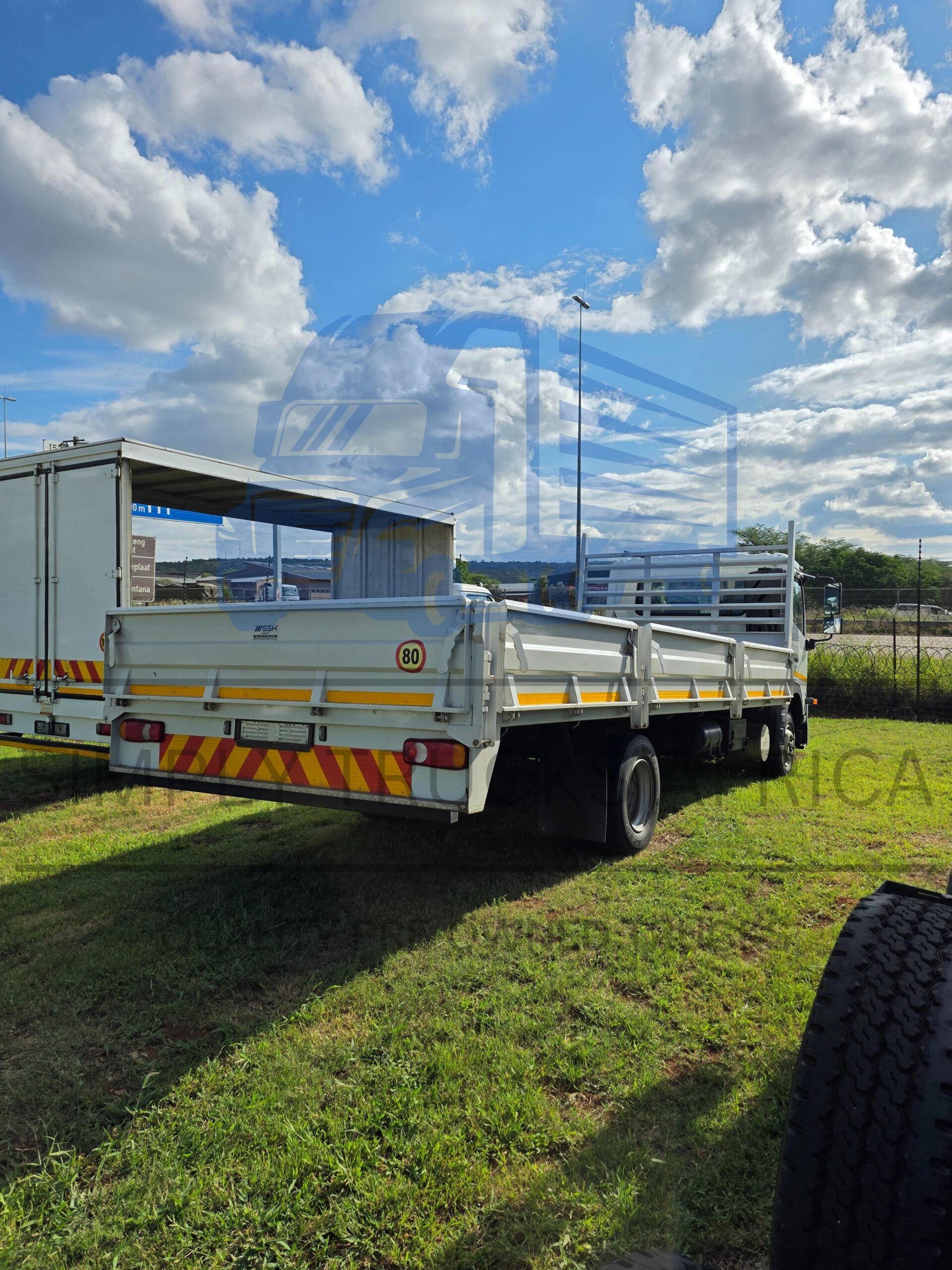 2025 UD Croner MKE 210 Dropside Body - Rear view