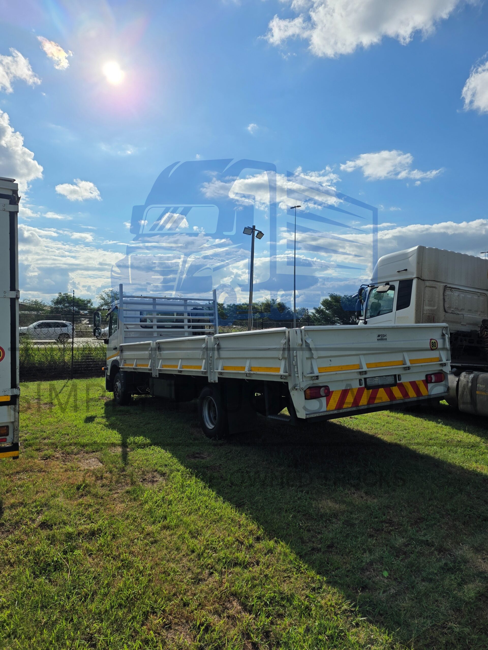 2025 UD Croner MKE 210 Dropside Body - Rear view